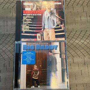 Two Adam Sandler movie soundtracks